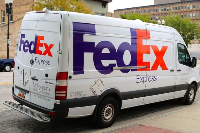 USPS vs UPS vs FedEx: Rates & Services (2026)